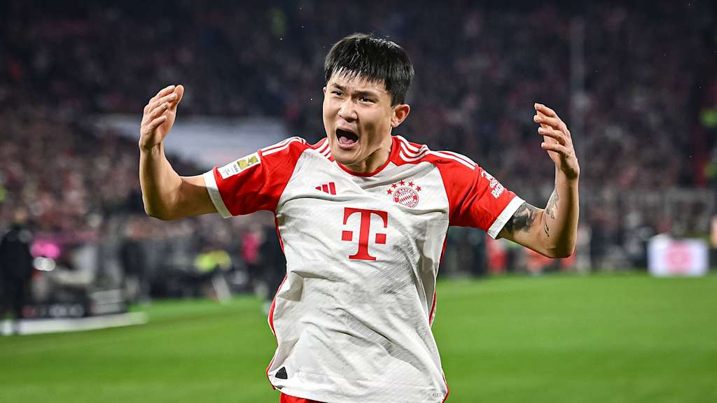 Minjae Kim celebrates against Stuttgart.
