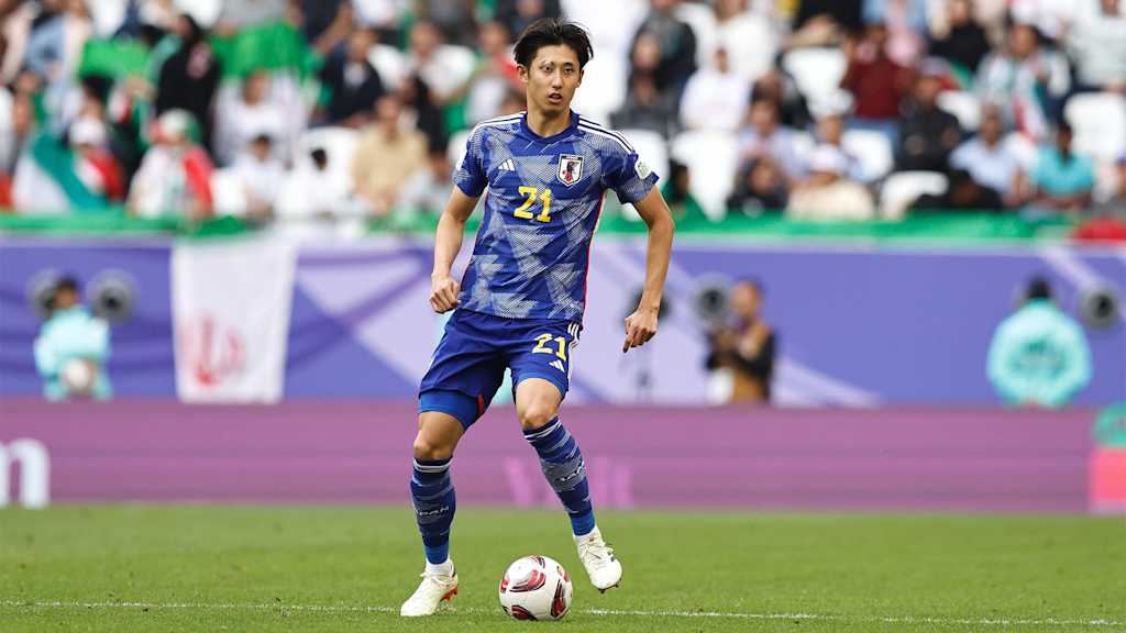 Hiroki Ito with the ball at his feet for Japan at the 2023 Asian Cup.