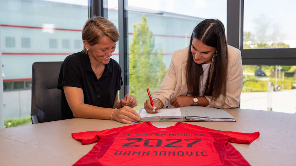 Director Bianca Rech and Damnjanović at the contract signing.