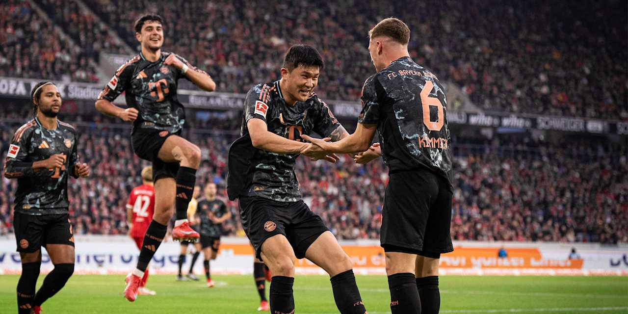 Minjae Kim and Joshua Kimmich during FC Bayern's match against Freiburg