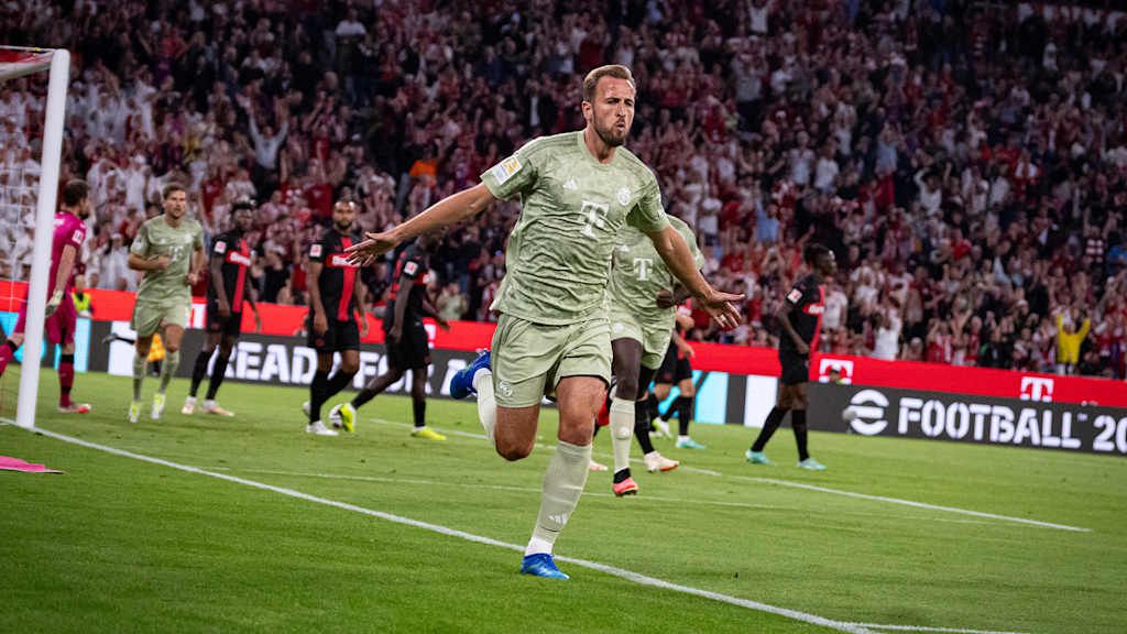 Harry Kane of FC Bayern celebrates his goal against Bayer 04 Leverkusen