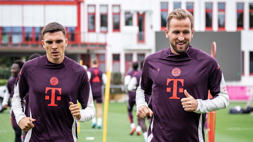 Joao Palhinha und Harry Kane laufen sich im Training des FC Bayern warm