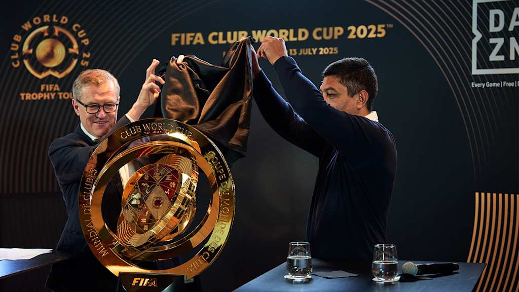 FC Bayern CEO Jan-Christian Dreesen and FCB Legend Giovane Elber unveil the Club World Cup trophy at a press conference