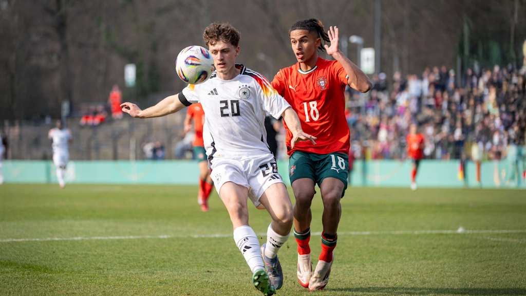 Maurice Krattenmacher in a tussle against Portugal.