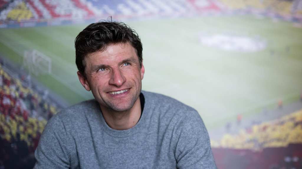 Thomas Müller faces the camera with a smile