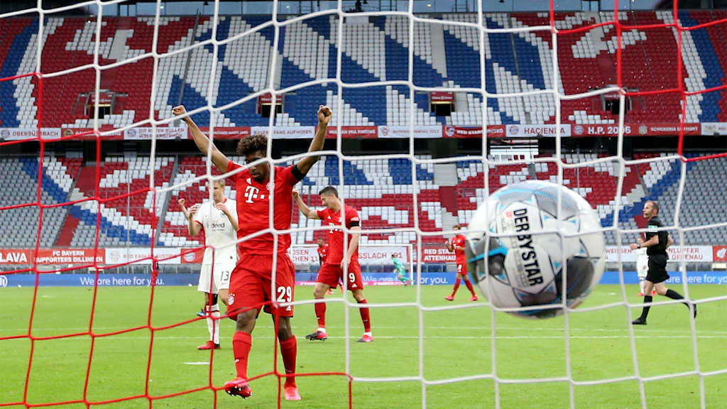 Kingsley Coman celebrates as the ball hits the Frankfurt net during an FC Bayern match behind closed doors.