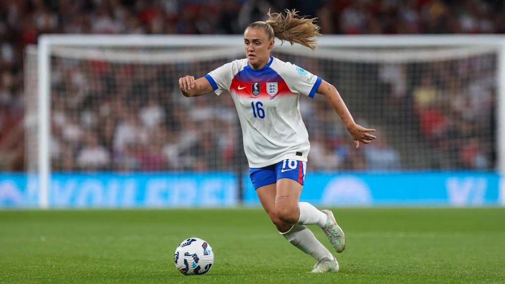 Georgia Stanway playing for England with the ball at her feet