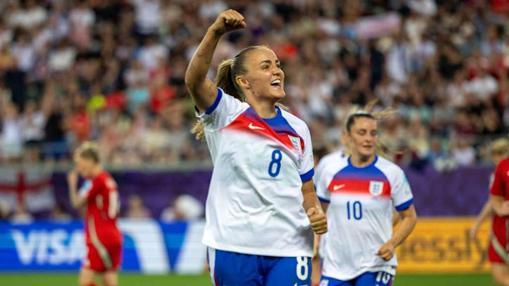 Georgia Stanway punches her fist in celebration.