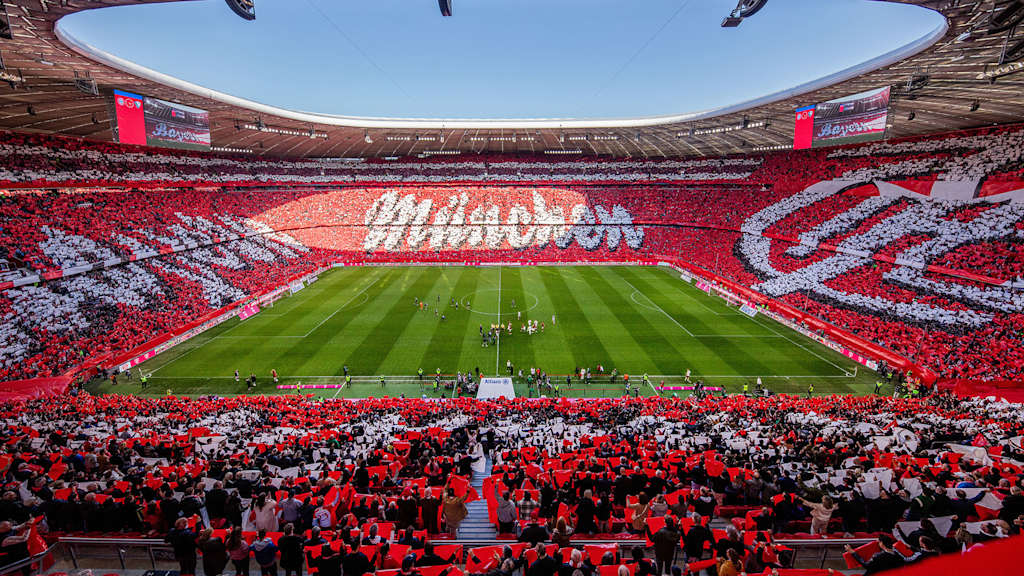 Tifo for club's 125th birthday at the Allianz Arena in red and write with the name Bayern München as well as a historic club crest.
