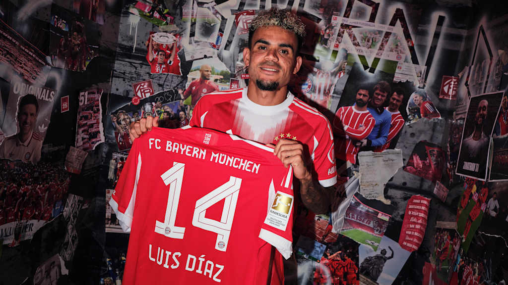 FC Bayern new signing Luis Diaz holds up a shirt with the number 14 on the back.
