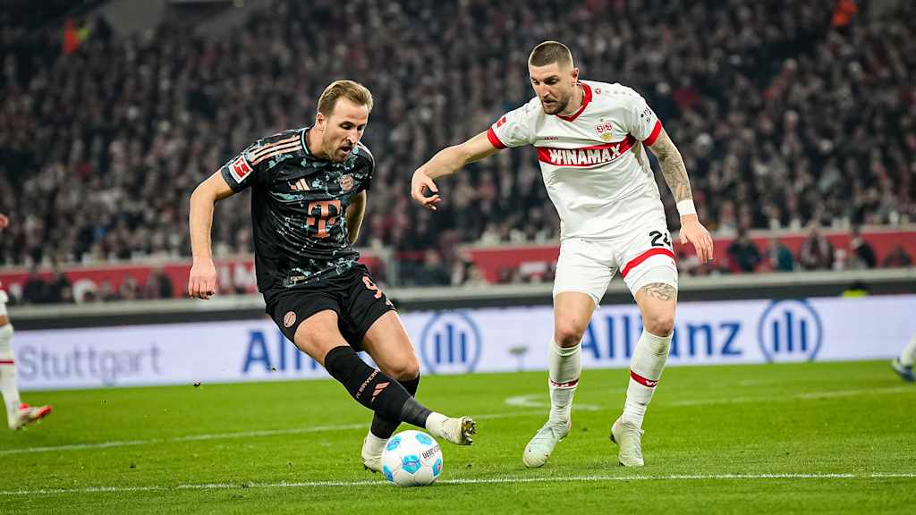 Harry Kane in a tussle with a VfB player