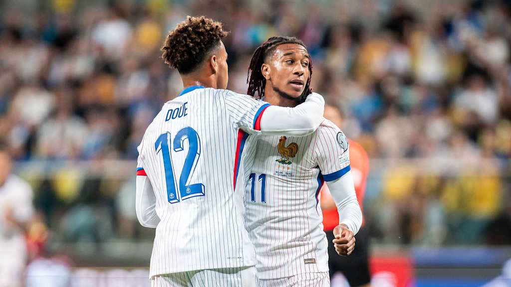 Michael Olise celebrates his goal in the international between France and Ukraine.
