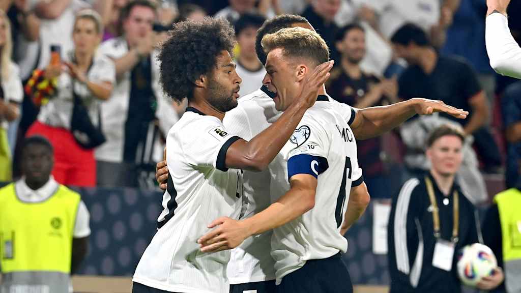 Serge Gnabry and Joshua Kimmich celebrating the opener against Northern Ireland.