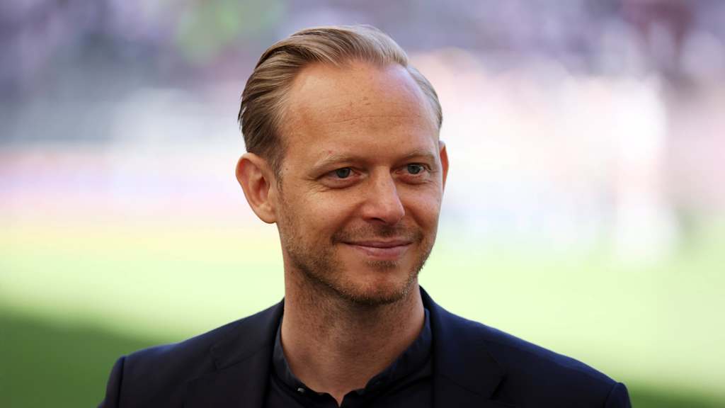 Rouven Kasper lächelt in die Kamera.