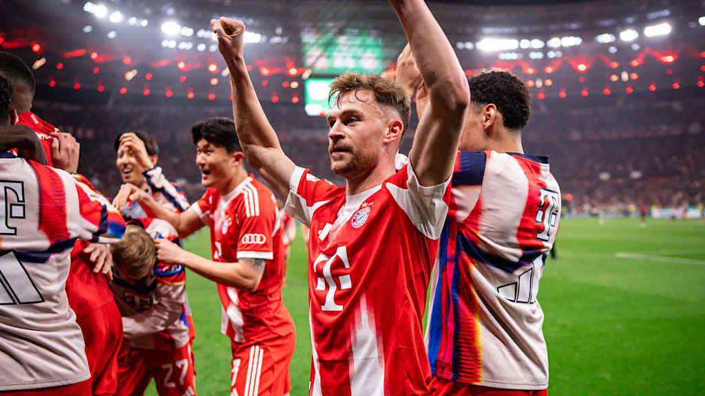 Joshua Kimmich celebrates reaching the final after FC Bayern's match in Leverkusen.