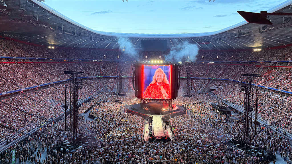 Stage show during the Helene Fischer concert at the Allianz Arena shows the artist on a huge screen