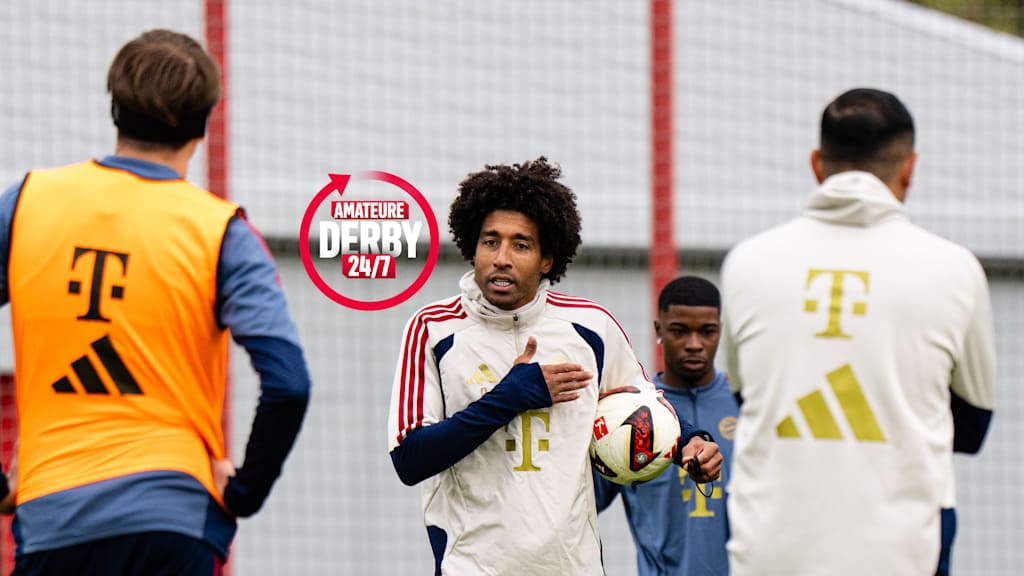 Dante klopft auf das FC Bayern Logo