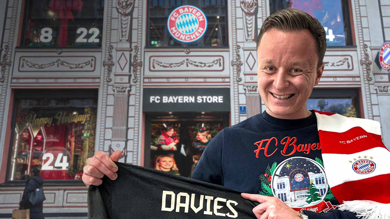 Our vlogger Lukas with a Davies jersey outside FC Bayern World