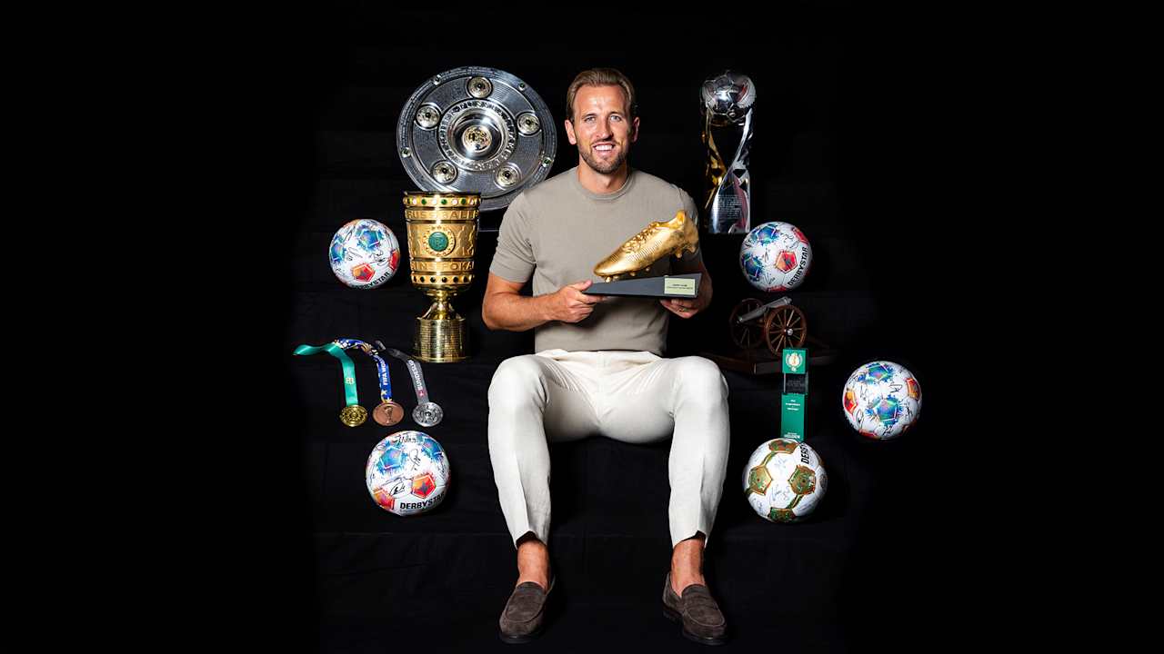 Harry Kane with the trophies from the 2025/26 season and the Golden Shoe
