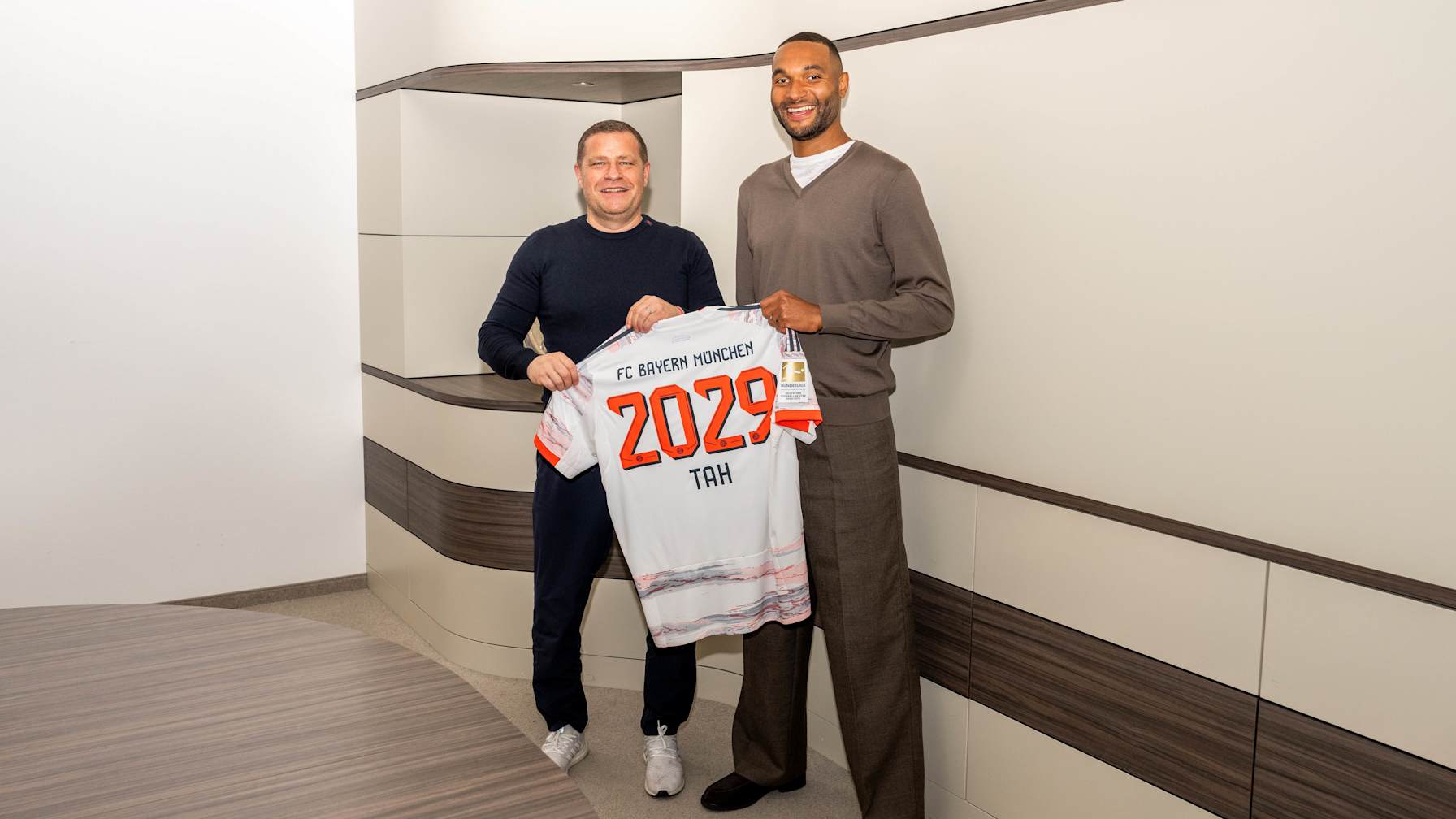 FC Bayern board member for sport, Max Eberl, with Jonathan Tah