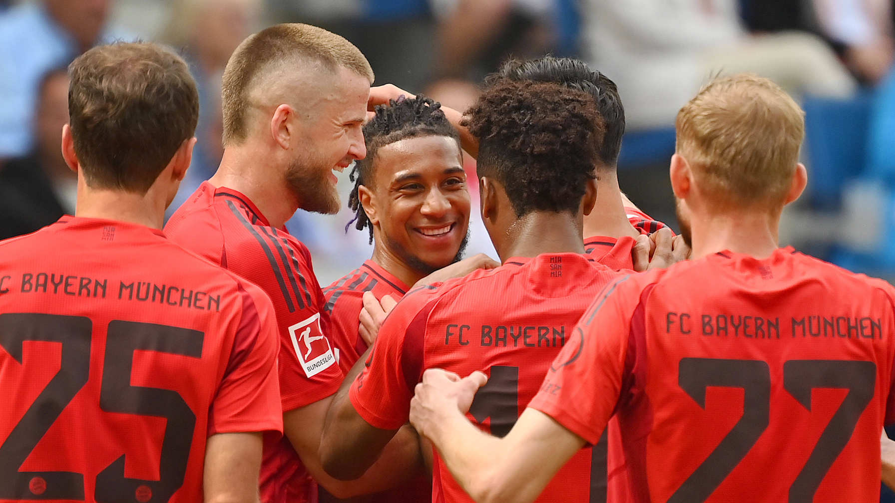 Michael Olise celebrates after scoring the FC Bayern May 2025 Goal of the Month.