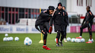 Michael Olise takes a shot in FC Bayern training