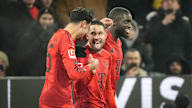 Raphael Guerreiro celebrates his goal to make it 2-0 against Hoffenheim