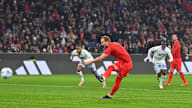 Harry Kane takes his penalty against Hoffenheim