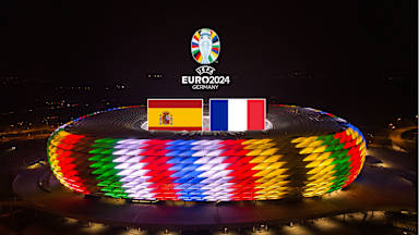 Spanish and French flags above the Allianz Arena illuminated specially for UEFA EURO 2024