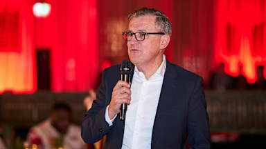 Jan-Christian Dreesen gives a speech following FC Bayern's match against Shakhtar Donetsk