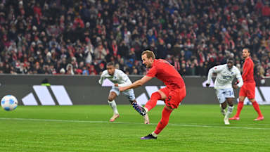 Harry Kane takes his penalty against Hoffenheim