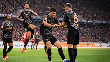 Minjae Kim and Joshua Kimmich during FC Bayern's match against Freiburg