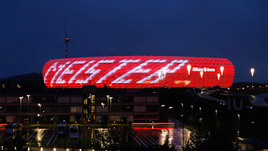 Allianz Arena lights up with white lettering 'Meister' (Champions)