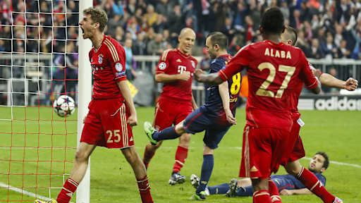 Thomas Müller celebrates against Barcelona in the 2012/13 Champions League semi-final.