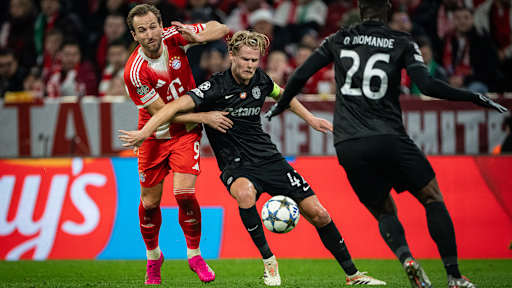 Harry Kane im Zweikampf mit Hjulmand im Spiel gegen Sporting