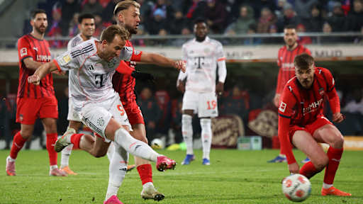 Harry Kane zieht ab zum 4:0 im Bundesliga-Spiel des FC Bayern in Heidenheim.