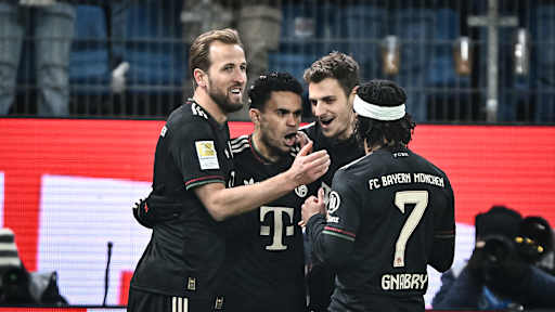 Harry Kane, Luis Díaz and Josip Stanišić celebrate during FC Bayern's Bundesliga away match at Hamburger SV