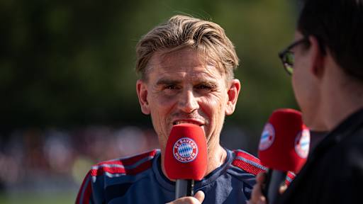 Christoph Freund being interviewed at FC Bayern's friendly against FC Rottach-Egern