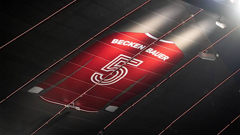 Drawing of Beckenbauer jersey with number 5 under the roof of the Allianz Arena