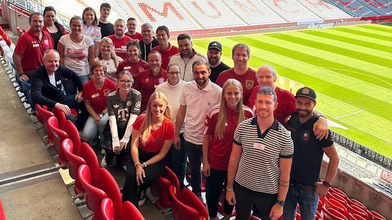 Youth managers of FC Bayern fan clubs visiting the Allianz Arena
