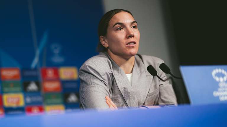 Vanessa Gilles speaks on the stage at the press conference