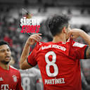 Serge Gnabry und Javi Martinez jubeln zusammen.