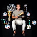 Harry Kane with the trophies from the 2025/26 season and the Golden Shoe