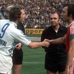 Günter Pröpper (Wuppertaler SV) and Franz Beckenbauer (FC Bayern Munich) - Shake hands before the game