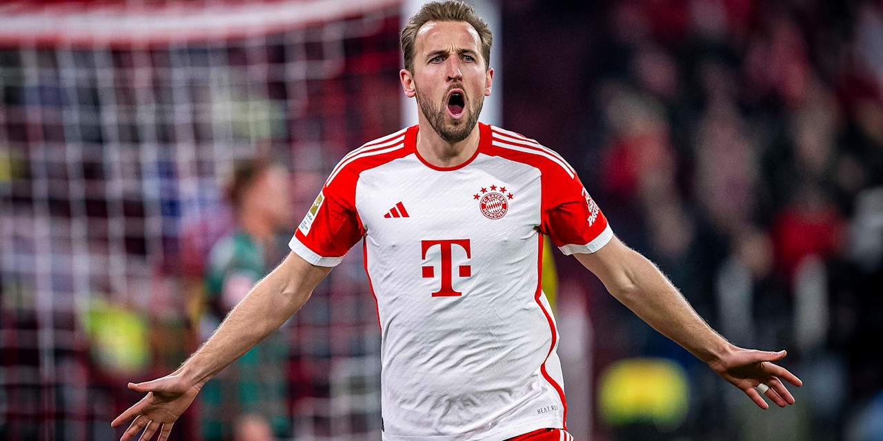Harry Kane celebrates scoring against VfB Stuttgart.