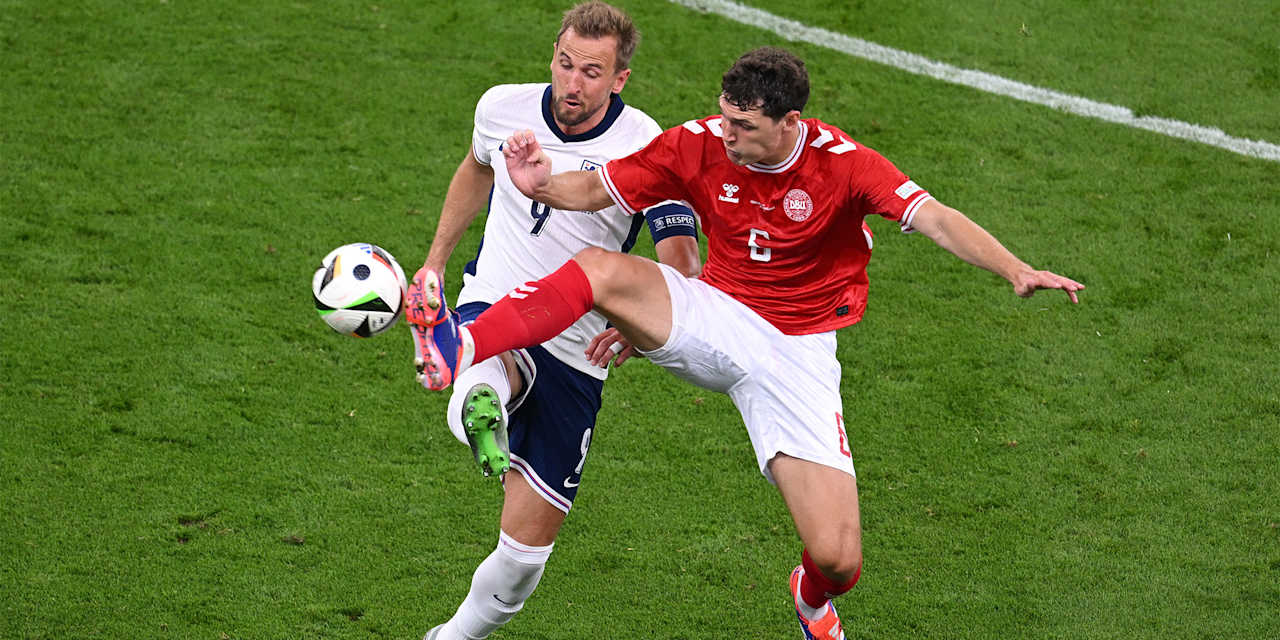 Harry Kane challenges Andreas Christensen in England's EURO game