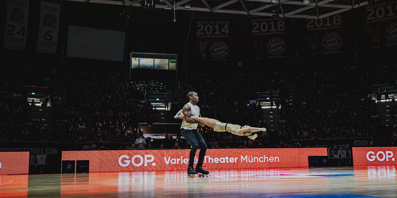 Besucher der FC Bayern Basketball-Spiele erhalten ein zusätzliches Highlight und gewinnen einen Eindruck von den außergewöhnlichen Leistungen der GOP-Artisten