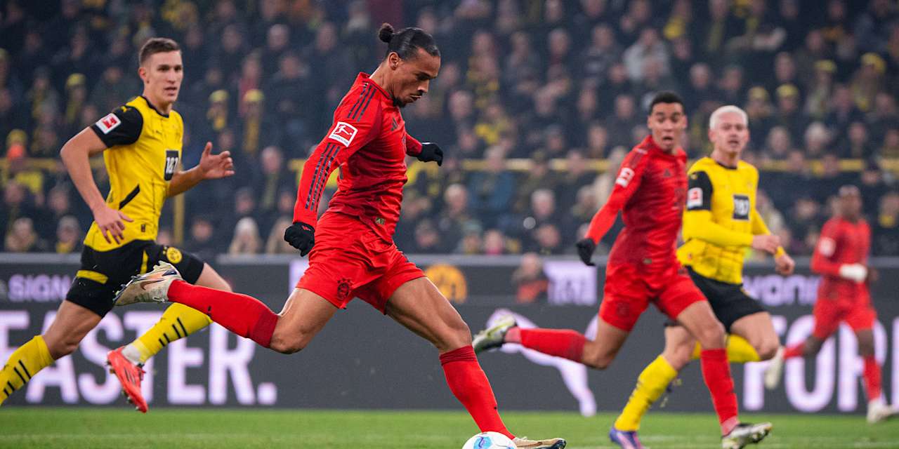 Leroy Sané beim Torabschluss im Spiel Bor. Dortmund gegen FC Bayern