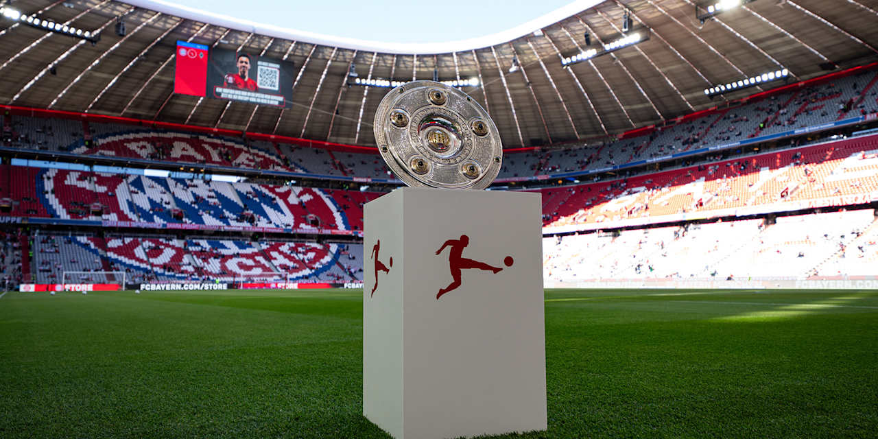 Meisterschale on a stand on the Allianz Arena pitch