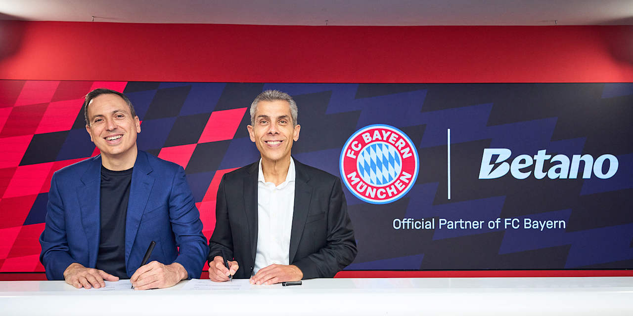 Directors George Daskalakis and Michael Diederich seal the partnership between FC Bayern and Betano